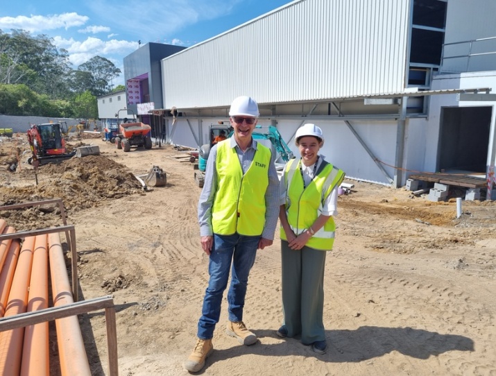Frank Sammit, Central Coast Industry Connect and Dr Lisa Barnes RDA Central Coast in hard hats and high vis vests at construction site.